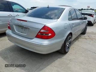 2003 Mercedes-Benz E-Class 3.2L with VIN WDBUF65J23A200332, listed as a IAAI auction lot 42046189 with 269,668 mi miles. Bid and sale history available at carsss.com. Image 4.