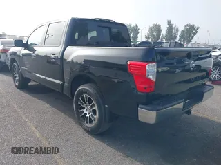 2021 Nissan Titan Pro-4X with VIN 1N6AA1ED8MN502425, listed as a IAAI auction lot 42464389 with 38,957 mi miles and . Bid and sale history available at DreamBid. Image 3.