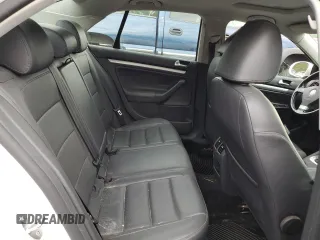 2009 Volkswagen Jetta SE with VIN 3VWRZ71K69M120110, listed as a Copart auction lot 64813905 with 114,552 mi miles and Salvage title. Bid and sale history available at DreamBid. Image 10.