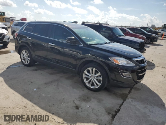 2012 Mazda CX-9 Grand Touring with VIN JM3TB2DA0C0336152, listed as a Copart auction lot 54743635 with 135,198 mi miles and Salvage Title. Bid and sale history available at carsss.com. Image 4.