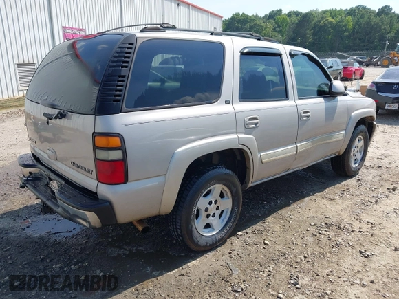 2004 Chevrolet Tahoe LT with VIN 1GNEK13Z64J292910, listed as a IAAI auction lot 42570170 with 309,679 mi miles and . Bid and sale history available at DreamBid. Image 4.