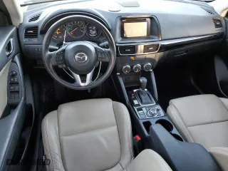 2016 Mazda CX-5 Sport with VIN JM3KE2BY3G0877107, listed as a Copart auction lot 87621635 with 83,093 mi miles and Salvage Title. Bid and sale history available at carsss.com. Image 8.