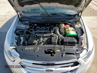 2013 Ford Taurus Limited with VIN 1FAHP2F84DG129904, listed as a Copart auction lot 58218205 with 105,877 mi miles and Salvage title. Bid and sale history available at DreamBid. Image 11.