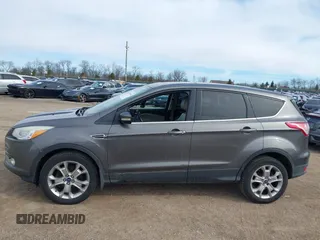 2013 Ford Escape SEL with VIN 1FMCU0HX0DUD71088, listed as a IAAI auction lot 41880044 with 155,439 mi miles. Bid and sale history available at carsss.com. Image 14.