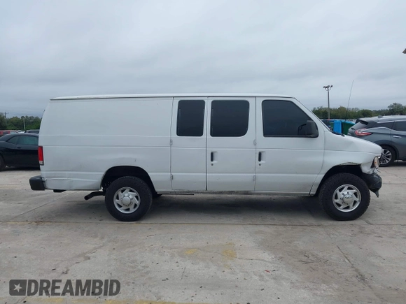 2002 Ford Econoline Cargo with VIN 1FTSS34L62HA53783, listed as a IAAI auction lot 41403058 with 306,576 mi miles and . Bid and sale history available at DreamBid. Image 13.
