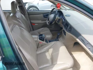 1998 Buick Regal LS with VIN 2G4WB52K3W1448533, listed as a IAAI auction lot 41930225 with 209,084 mi miles. Bid and sale history available at carsss.com. Image 5.