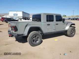 2022 Jeep Gladiator Rubicon z VIN 1C6JJTBG9NL101774, wystawiony jako Copart lot #74597074 z przebiegiem 11 903 mil mil oraz Szkoda całkowita • Salvage title. Historia ofert i sprzedaży dostępna na DreamBid. Obrazek 3.