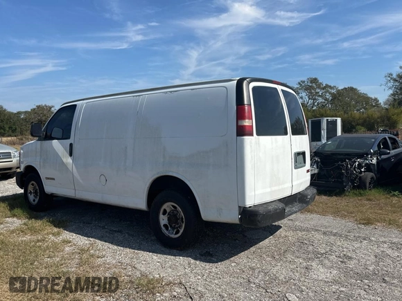 2003 GMC Savana Cargo z VIN 1GTHG35U431113170, wystawiony jako Copart lot #44413145 z przebiegiem 293 807 mil mil oraz Czysty tytuł • Clean title. Historia ofert i sprzedaży dostępna na DreamBid. Obrazek 3.