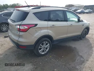 2018 Ford Escape SE z VIN 1FMCU9GD1JUB02119, wystawiony jako IAAI lot #42092393 z przebiegiem 69 309 mil mil oraz . Historia ofert i sprzedaży dostępna na DreamBid. Obrazek 4.