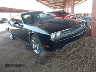 2013 Dodge Challenger SXT z VIN 2C3CDYAG1DH629087, wystawiony jako IAAI lot #41993728 z przebiegiem 226 948 mil mil oraz . Historia ofert i sprzedaży dostępna na DreamBid. Obrazek 1.