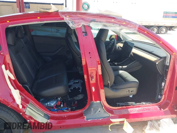 2020 Tesla Model Y Long Range with VIN 5YJYGDEE0LF029496, listed as a IAAI auction lot 41977695 with 47,958 mi miles and . Bid and sale history available at DreamBid. Image 6.