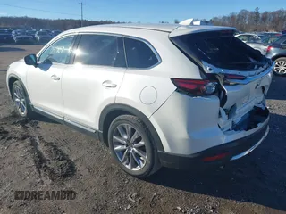 2023 Mazda CX-9 Grand Touring with VIN JM3TCBDY4P0633456, listed as a IAAI auction lot 41510127 with 24,706 mi miles and . Bid and sale history available at carsss.com. Image 3.