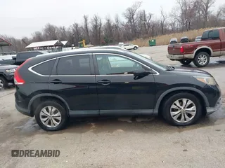 2014 Honda CR-V EX-L with VIN 2HKRM4H73EH662329, listed as a IAAI auction lot 41800191 with 212,800 mi miles. Bid and sale history available at carsss.com. Image 13.