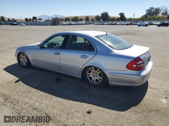 2003 Mercedes-Benz E-Class 3.2L with VIN WDBUF65JX3A096821, listed as a Copart auction lot 74378684 with 157,088 mi miles and Clean Title. Bid and sale history available at carsss.com. Image 2.