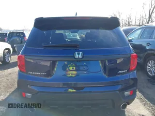 2023 Honda Passport EX-L with VIN 5FNYF8H51PB028045, listed as a IAAI auction lot 41609342 with 52,920 mi miles and . Bid and sale history available at DreamBid. Image 17.