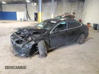 2021 BMW 2 Series 228i xDrive with VIN WBA73AK07M7H15802, listed as a Copart auction lot 61774065 with 31,761 mi miles and Salvage title. Bid and sale history available at DreamBid. Image 1.