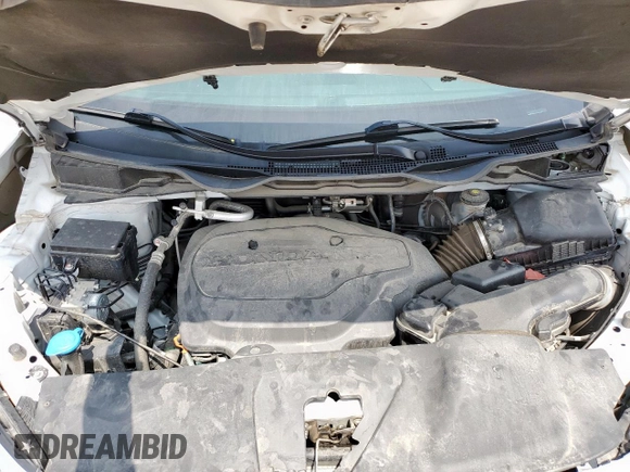 2023 Honda Odyssey Touring с VIN 5FNRL6H8XPB001311, выставлен на аукционе Copart как лот 56924345 с пробегом 77 736 миль миль и Списание • Salvage title. История ставок и продаж доступна на DreamBid. Изображение 12.