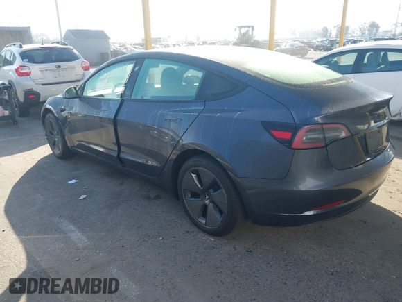2023 Tesla Model 3 with VIN 5YJ3E1EA5PF697201, listed as a IAAI auction lot 41589422 with 16,862 mi miles and . Bid and sale history available at carsss.com. Image 3.