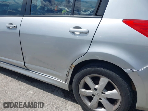 2012 Nissan Versa S with VIN 3N1BC1CP3CK253098, listed as a IAAI auction lot 42111977 with 180,210 mi miles. Bid and sale history available at carsss.com. Image 6.