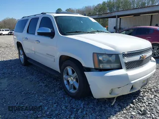 2011 Chevrolet Suburban LT with VIN 1GNSCJE05BR357775, listed as a IAAI auction lot 41807667 with 327,313 mi miles. Bid and sale history available at carsss.com. Image 1.
