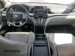 2018 Honda Odyssey EX-L with VIN 5FNRL6H77JB009851, listed as a Copart auction lot 52203155 with 127,575 mi miles and Salvage Title. Bid and sale history available at carsss.com. Image 8.