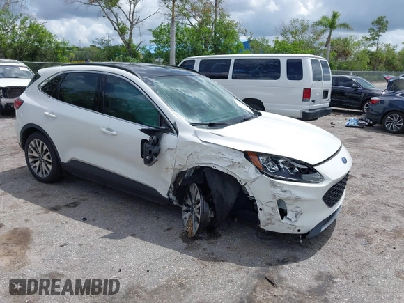 2020 Ford Escape Titanium Hybrid with VIN 1FMCU0DZ3LUC07842, listed as a IAAI auction lot 42456359 with 62,756 mi miles and . Bid and sale history available at DreamBid. Image 1.
