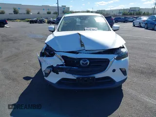 2021 Mazda CX-3 Sport with VIN JM1DKDB75M1500023, listed as a IAAI auction lot 41461424 with 65,162 mi miles. Bid and sale history available at carsss.com. Image 12.