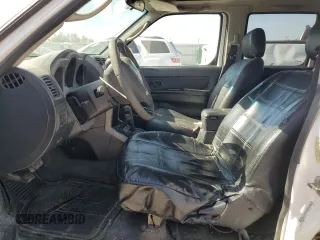2002 Nissan Frontier SC z VIN 1N6MD29Y52C369414, wystawiony jako Copart lot #58532505 z przebiegiem 249 926 mil mil oraz Szkoda całkowita • Salvage title. Historia ofert i sprzedaży dostępna na DreamBid. Obrazek 7.