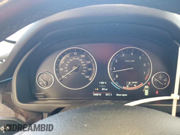 2014 BMW X5 sDrive35i with VIN 5UXKR2C55E0H31629, listed as a Copart auction lot 50957095 with 166,816 mi miles and Clean Title. Bid and sale history available at carsss.com. Image 9.