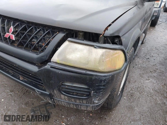 2000 Mitsubishi Montero LS z VIN JA4LS31H6YP004497, wystawiony jako IAAI lot #41403319 z przebiegiem 259 107 mil mil oraz . Historia ofert i sprzedaży dostępna na DreamBid. Obrazek 13.