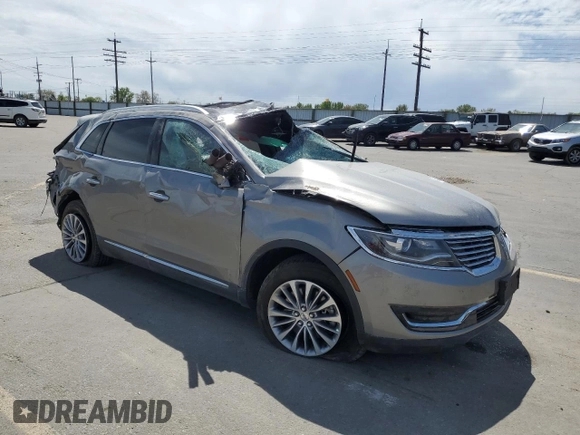 2016 Lincoln MKX Select z VIN 2LMTJ8KR9GBL38493, wystawiony jako Copart lot #54258865 z przebiegiem Nie podano mil oraz Szkoda całkowita • Salvage title. Historia ofert i sprzedaży dostępna na DreamBid. Obrazek 4.