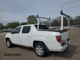 2006 Honda Ridgeline RTL with VIN 2HJYK16526H521064, listed as a Copart auction lot 55317705 with 253,335 mi miles and Clean Title. Bid and sale history available at carsss.com. Image 2.