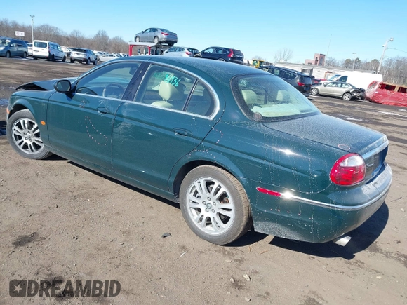 2005 Jaguar S-Type with VIN SAJWA01T95FN51551, listed as a IAAI auction lot 41637854 with 90,075 mi miles and . Bid and sale history available at DreamBid. Image 3.
