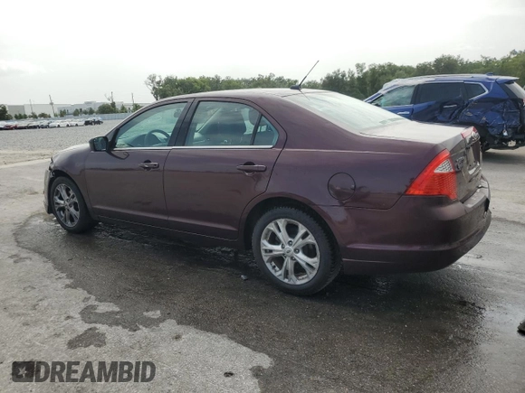 2012 Ford Fusion SE with VIN 3FAHP0HA3CR400074, listed as a Copart auction lot 59180065 with 168,416 mi miles and Salvage title. Bid and sale history available at DreamBid. Image 2.