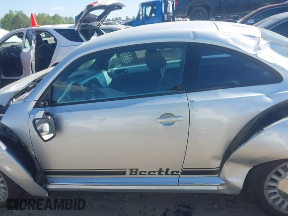 2014 Volkswagen Beetle 2.5L w/Sun with VIN 3VWJP7AT7EM633386, listed as a IAAI auction lot 42060290 with 273,374 mi miles and . Bid and sale history available at DreamBid. Image 15.