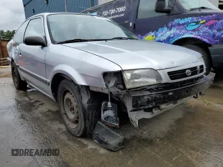 1997 Toyota Tercel CE z VIN JT2AC52L1V0227973, wystawiony jako Copart lot #56672512 z przebiegiem 301 799 mil mil oraz Szkody całkowita. Historia ofert i sprzedaży dostępna na DreamBid. Obrazek 1.
