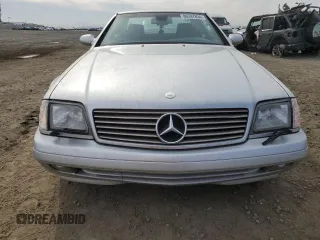 1999 Mercedes-Benz SL-Class with VIN WDBFA68F4XF184335, listed as a Copart auction lot 86287834 with 97,564 mi miles and Salvage Title. Bid and sale history available at carsss.com. Image 5.