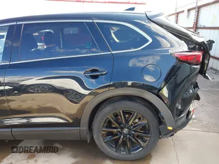 2023 Mazda CX-9 Touring Plus with VIN JM3TCBAY2P0657761, listed as a IAAI auction lot 41125586 with 12,425 mi miles and . Bid and sale history available at DreamBid. Image 19.