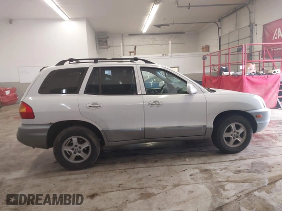 2004 Hyundai Santa Fe GLS with VIN KM8SC13E44U797943, listed as a IAAI auction lot 41731356 with 184,139 mi miles. Bid and sale history available at carsss.com. Image 13.
