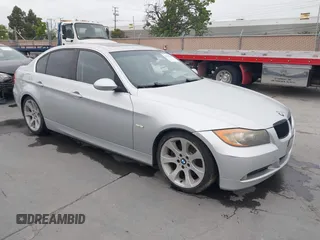 2006 BMW 3 Series 330i with VIN WBAVB33526KS31274, listed as a IAAI auction lot 42120518 with 167,203 mi miles. Bid and sale history available at carsss.com. Image 1.