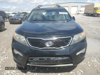 2012 Kia Sorento SX z VIN 5XYKW4A28CG193611, wystawiony jako Copart lot #57659935 z przebiegiem 203 349 mil mil oraz Szkoda całkowita • Salvage title. Historia ofert i sprzedaży dostępna na DreamBid. Obrazek 5.