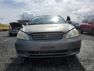 2004 Toyota Corolla CE with VIN 1NXBR32E44Z263126, listed as a Copart auction lot 50839945 with 204,086 mi miles and Salvage Title. Bid and sale history available at DreamBid. Image 5.