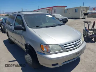 2002 Toyota Sienna LE with VIN 4T3ZF13C52U452607, listed as a IAAI auction lot 42620592 with 209,236 mi miles and . Bid and sale history available at DreamBid. Image 1.