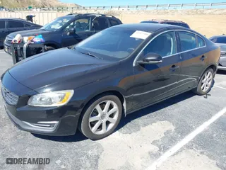 2016 Volvo S60 T5 Drive-E Premier with VIN YV126MFK5G2392022, listed as a IAAI auction lot 41517580 with 71,229 mi miles. Bid and sale history available at carsss.com. Image 2.