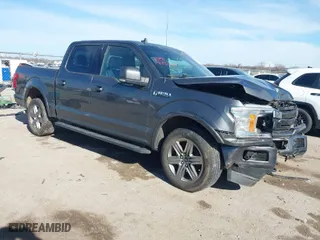 2018 Ford F-150 XL with VIN 1FTEW1E56JKE29843, listed as a IAAI auction lot 41292720 with 74,402 mi miles. Bid and sale history available at carsss.com. Image 1.