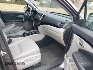 2017 Honda Pilot Touring with VIN 5FNYF6H92HB012090, listed as a IAAI auction lot 41882542 with 110,179 mi miles and . Bid and sale history available at DreamBid. Image 5.