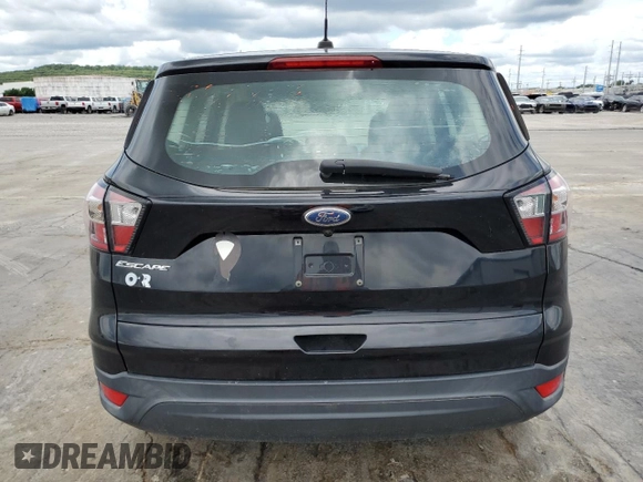2018 Ford Escape S с VIN 1FMCU0F77JUA30513, выставлен на аукционе Copart как лот 48898565 с пробегом 99 458 миль миль и Списание • Salvage title. История ставок и продаж доступна на DreamBid. Изображение 6.
