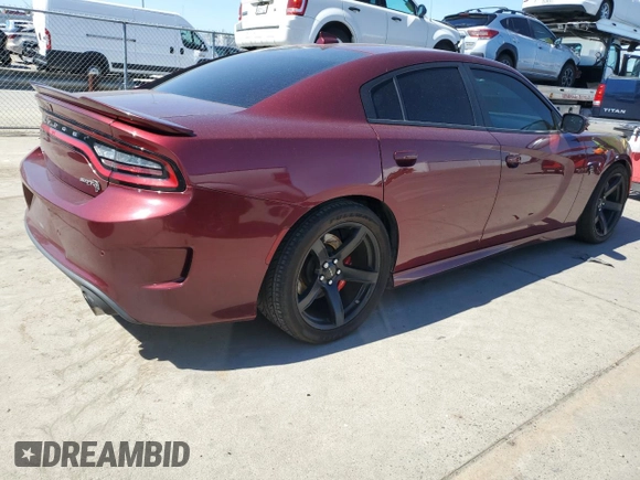 2019 Dodge Charger SRT Hellcat z VIN 2C3CDXL99KH726589, wystawiony jako Copart lot #50382825 z przebiegiem 36 117 mil mil oraz Czysty tytuł • Clean title. Historia ofert i sprzedaży dostępna na DreamBid. Obrazek 3.