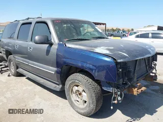 2002 Chevrolet Suburban LT z VIN 1GNEC16T32J304464, wystawiony jako IAAI lot #42403705 z przebiegiem 202 674 mil mil oraz . Historia ofert i sprzedaży dostępna na DreamBid. Obrazek 1.