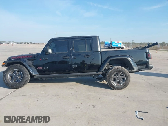 2023 Jeep Gladiator Rubicon z VIN 1C6JJTBGXPL543787, wystawiony jako IAAI lot #40963799 z przebiegiem 5 402 mil mil oraz . Historia ofert i sprzedaży dostępna na DreamBid. Obrazek 15.